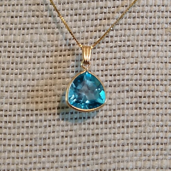 14K Yellow Gold Swiss Blue Topaz Pendant